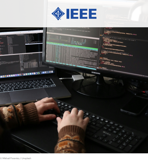 IEEE's cover picture represents someone using a computer. On the top is IEEE's logo on a white rectangle