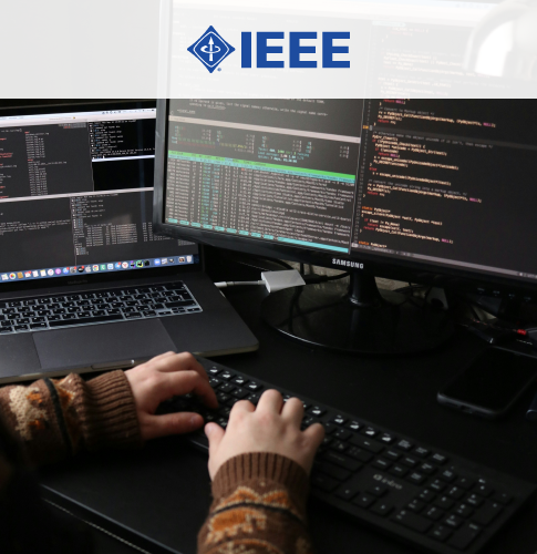 IEEE's cover picture represents someone using a computer. On the top is IEEE's logo on a white rectangle